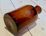 Medicine bottle with engraving